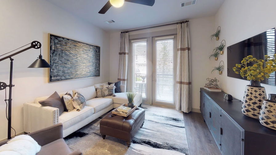 Home 5 Villa renovation in Dubai with a modern open-plan living room, updated flooring, and soft neutral finishes