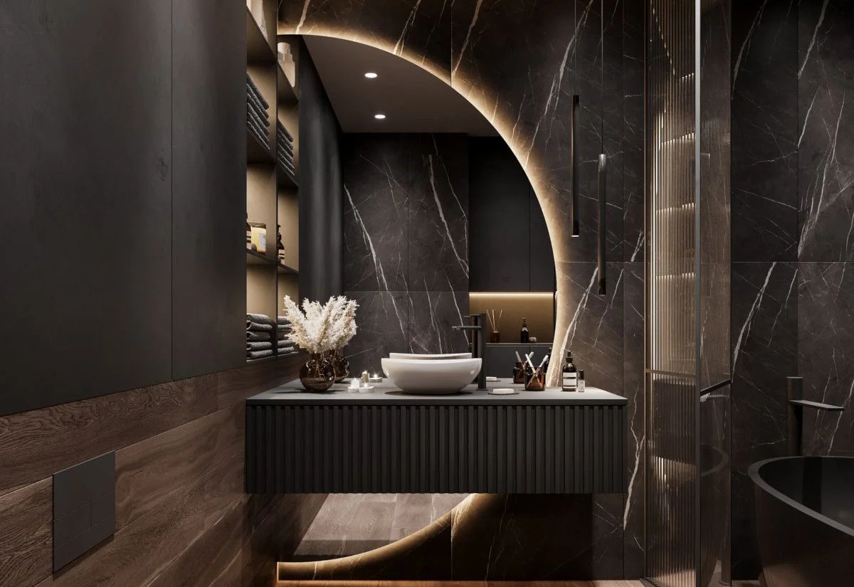 Luxury dark marble bathroom after full remodeling in Dubai with modern basin and premium lighting