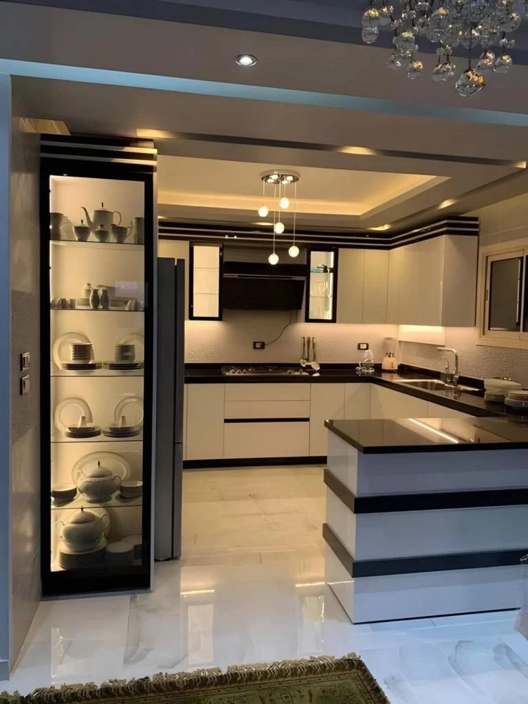 Modern kitchen renovation in Dubai with built-in cabinets and matching custom wardrobes for extra storage