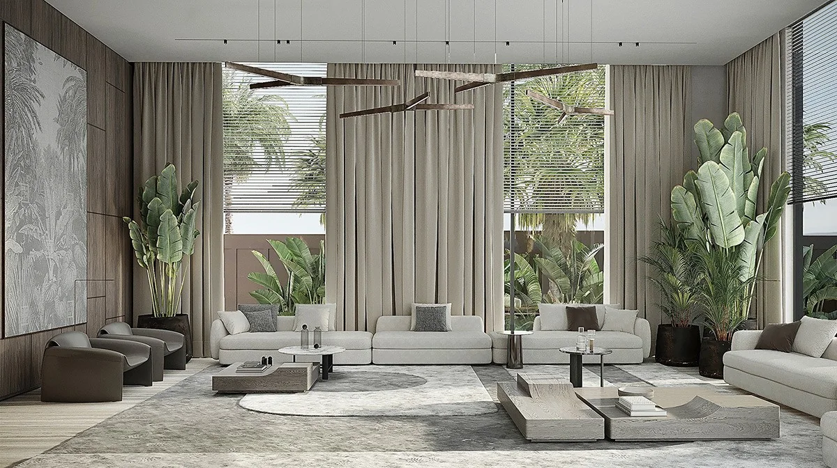 Modern majlis seating area in a Dubai villa with neutral sofas, soft lighting, and indoor greenery