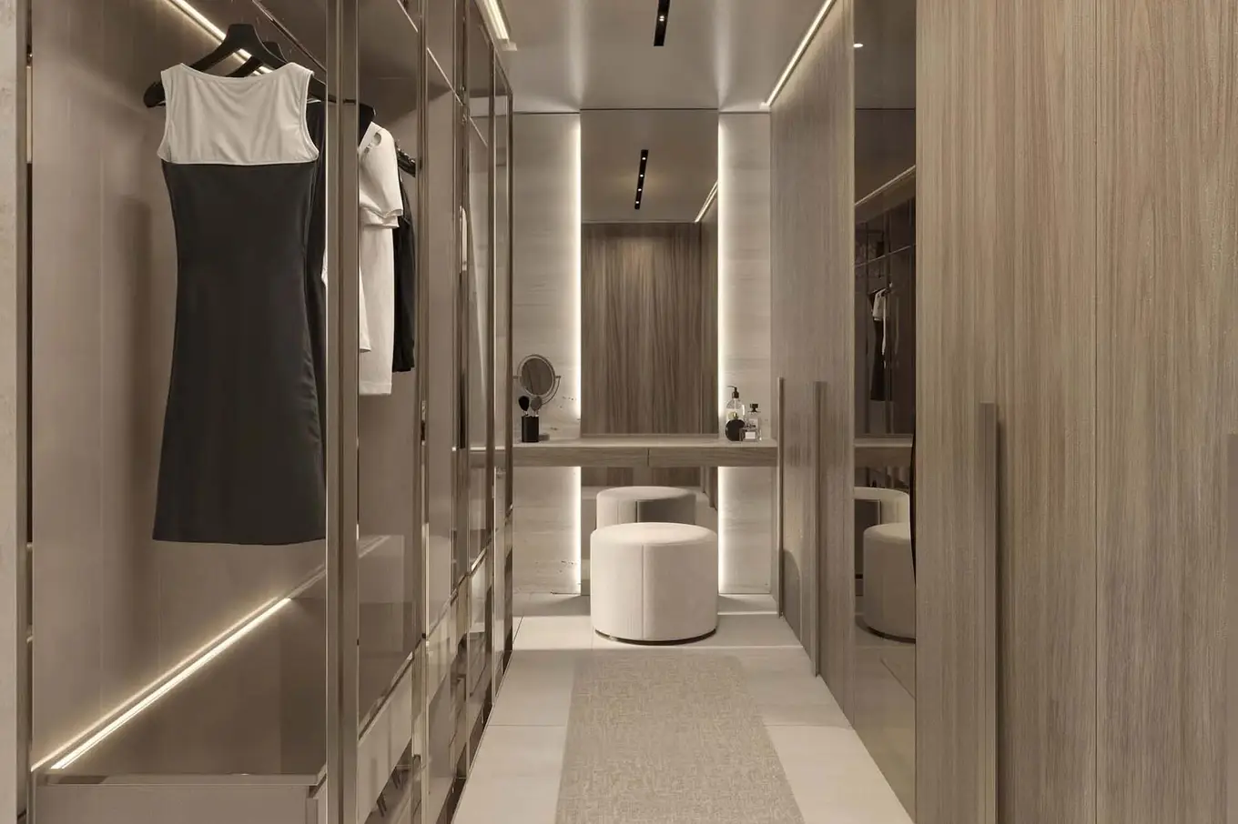 Walk-in wardrobe design with bespoke joinery, glass wardrobes, and soft LED lighting in a luxury villa