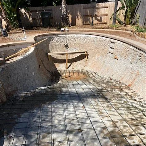 Home Base Interiors swimming pool construction Dubai rebar shell preparation stage