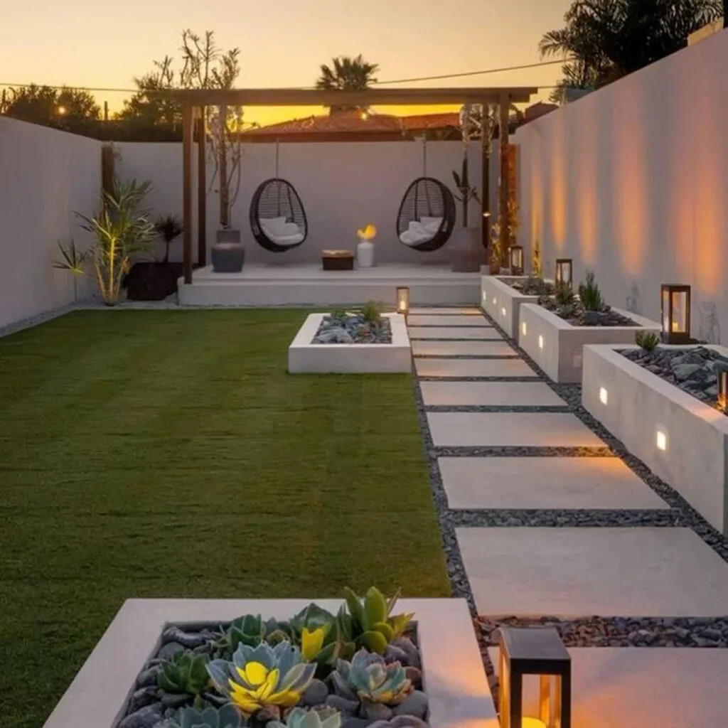 Modern minimal villa garden design in Dubai with clean paving, gravel lines, and soft outdoor lighting