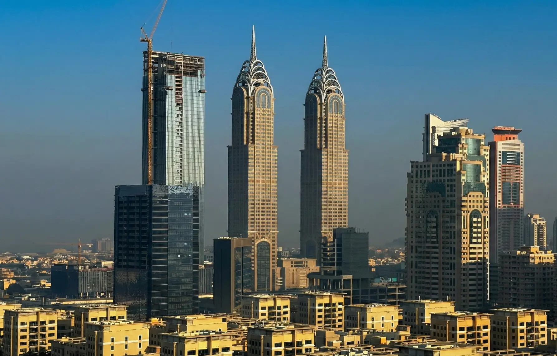 Dubai skyline with high-rise towers in daylight