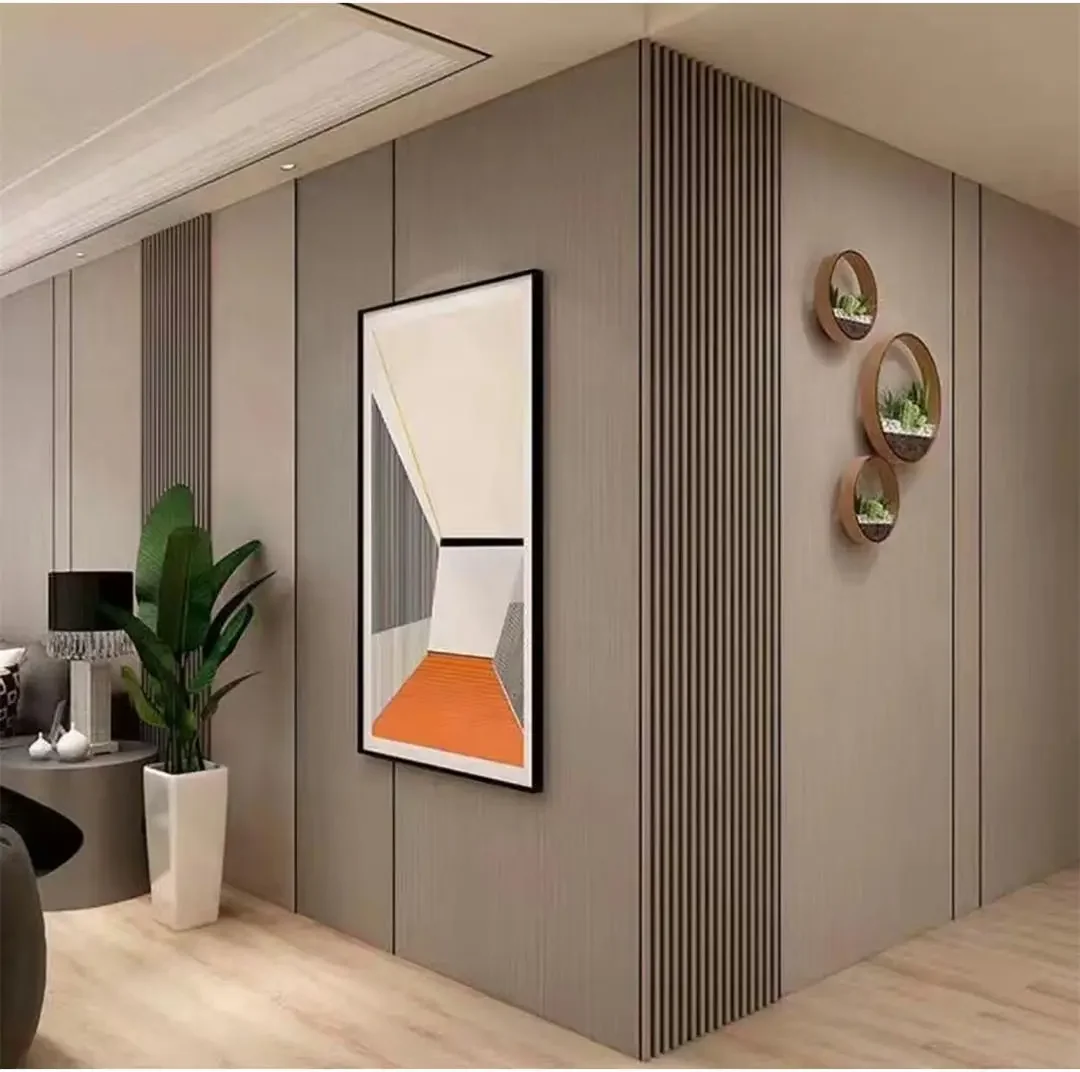 Modern feature wall cladding with vertical slat panels and matte wall panels in a Dubai living room.